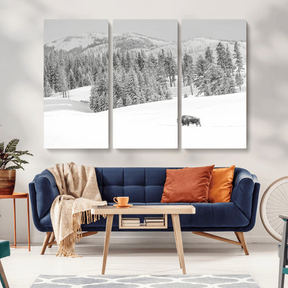 Snowy bison walking through white forest landscape, ideal for monochrome winter or wilderness-style interior wall decoration.