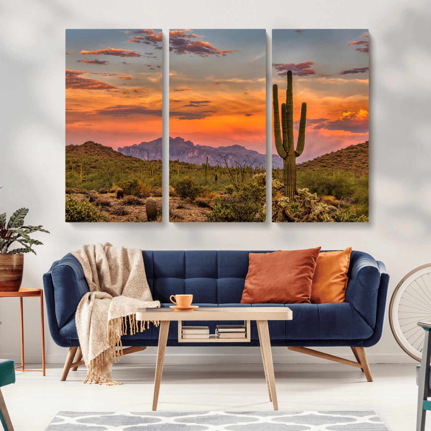 Vibrant desert sunset with saguaro cacti and distant mountains, perfect for Southwestern or warm-toned home decor.