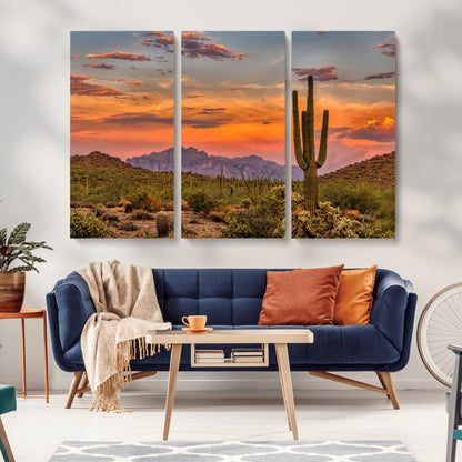 Vibrant desert sunset with saguaro cacti and distant mountains, perfect for Southwestern or warm-toned home decor.
