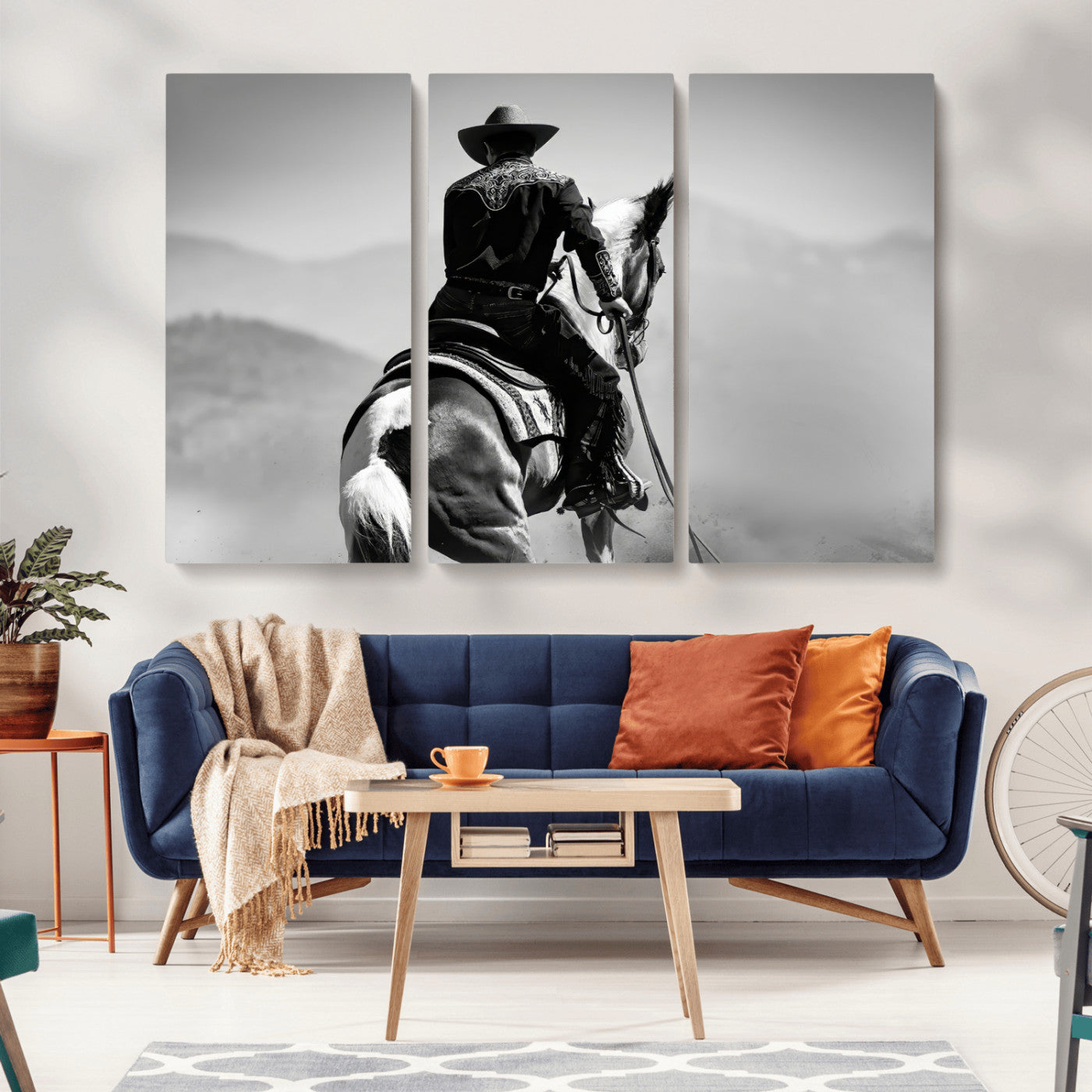 Black and white canvas of a cowboy on horseback with moody tones, perfect for rustic western or country-inspired home decor.