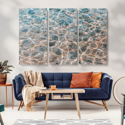 Close-up of sunlit ocean ripples with aqua blue and golden tones, ideal for modern coastal or minimalist home decor.