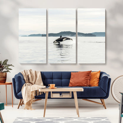 An orca jumping out of calm ocean waters with a misty island in the background, creating a serene and minimalist marine wildlife scene.