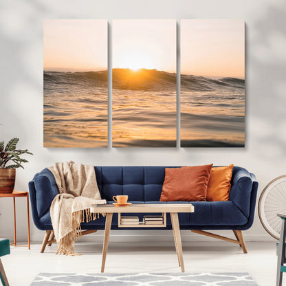 Ocean waves glowing under a warm golden sunset, reflecting soft light and calm movement, perfect for warm minimalist coastal interiors.