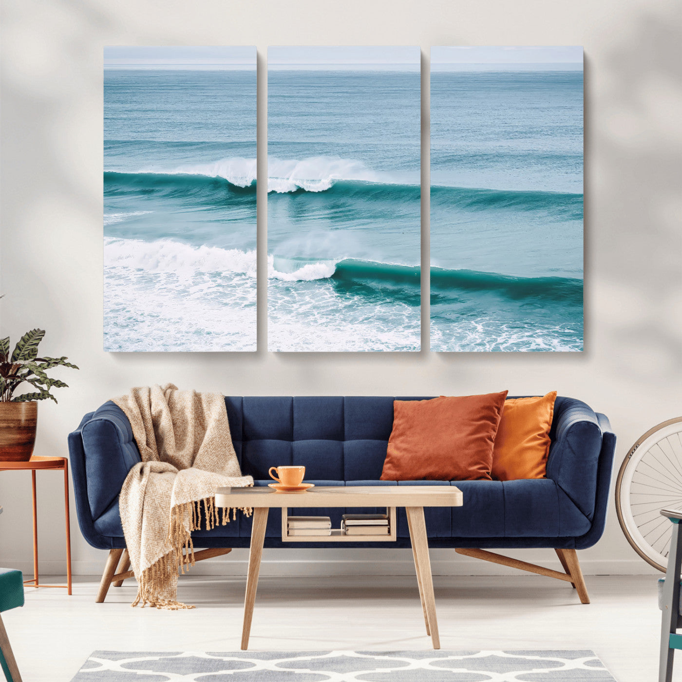 Powerful ocean waves rolling towards the shore, their turquoise hues blending with white sea foam under an open horizon, capturing the essence of the ocean's movement.