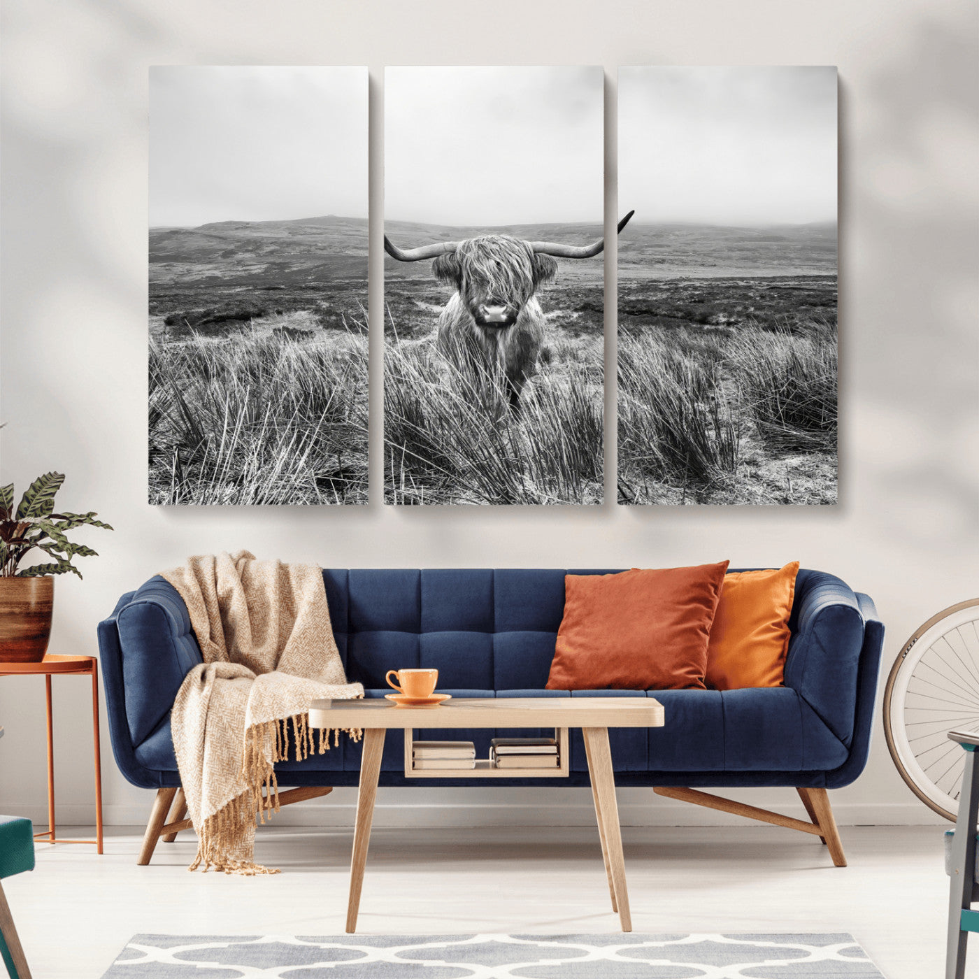 A black and white portrait of a Highland cow in a foggy Scottish countryside, capturing a rustic aesthetic and tranquil farm escape.