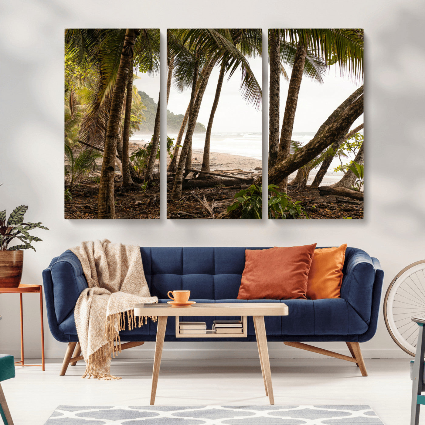Dense tropical palm trees framing a sandy beach and ocean shore, ideal for jungle or coastal themed interior wall decor.