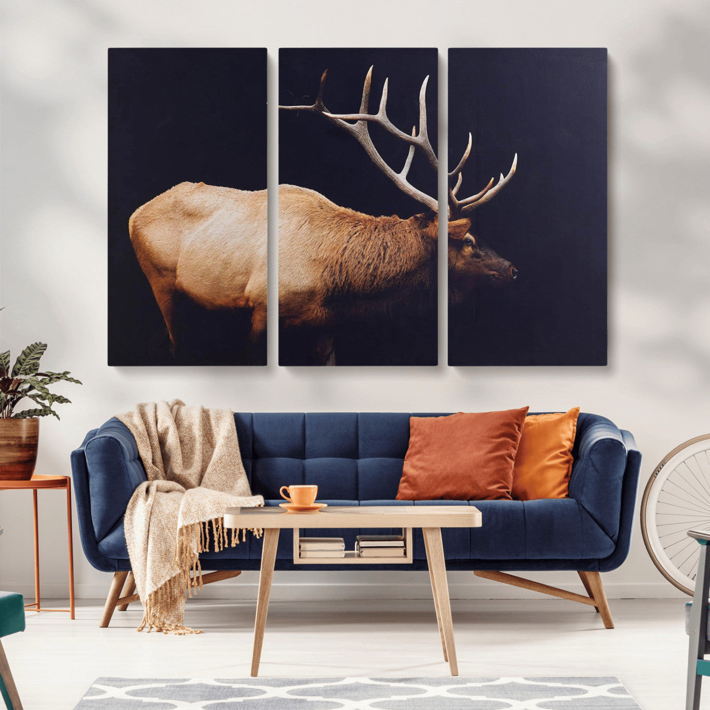 Side profile of an elk with large antlers on dark background, creating a bold rustic statement for cabin or Western-themed decor.