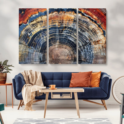Vibrant tree ring with orange, brown, and blue tones in abstract detail, perfect for rustic or boho-inspired wall decor.