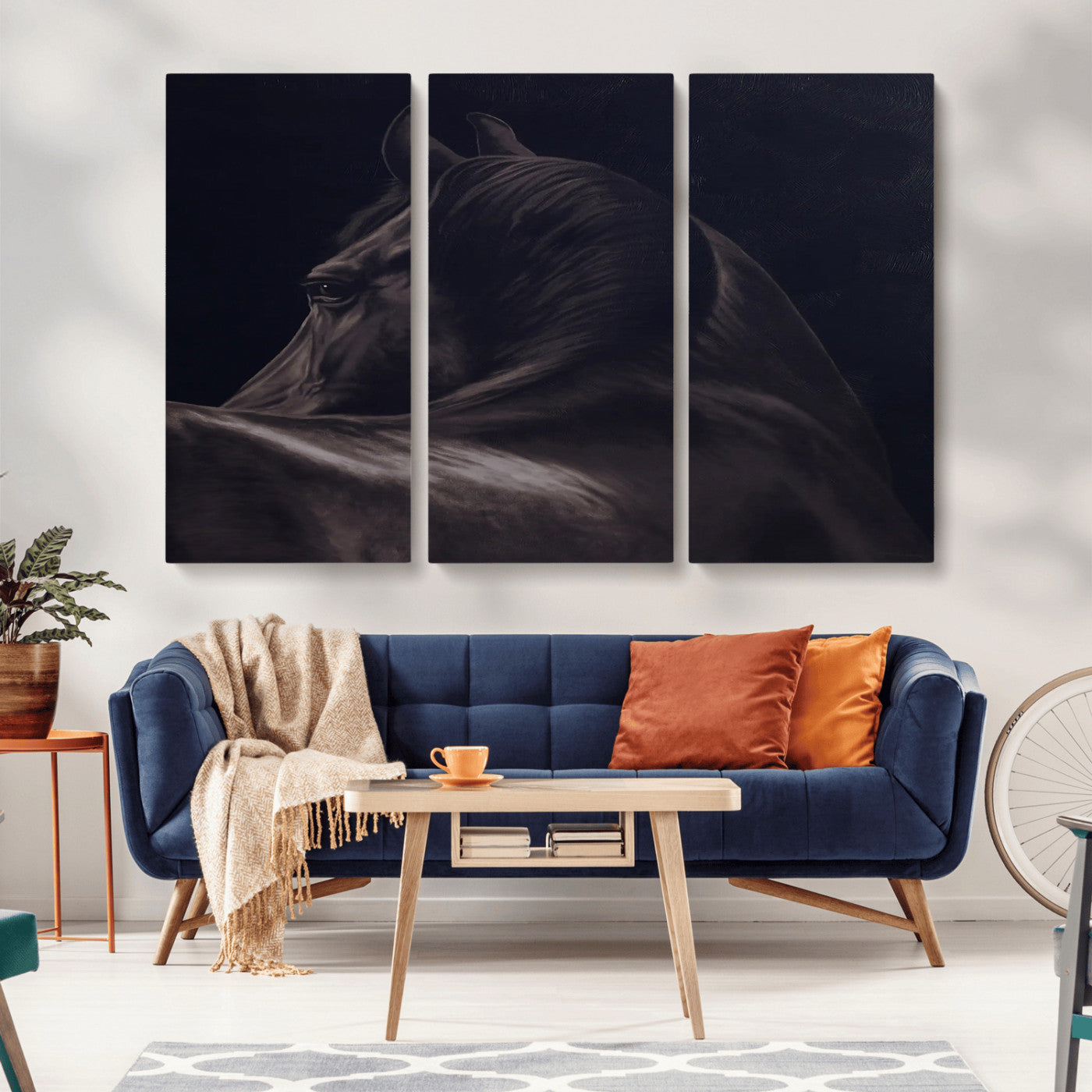 Close-up of a black horse with dramatic lighting on a dark background, perfect for rustic or masculine home decor.