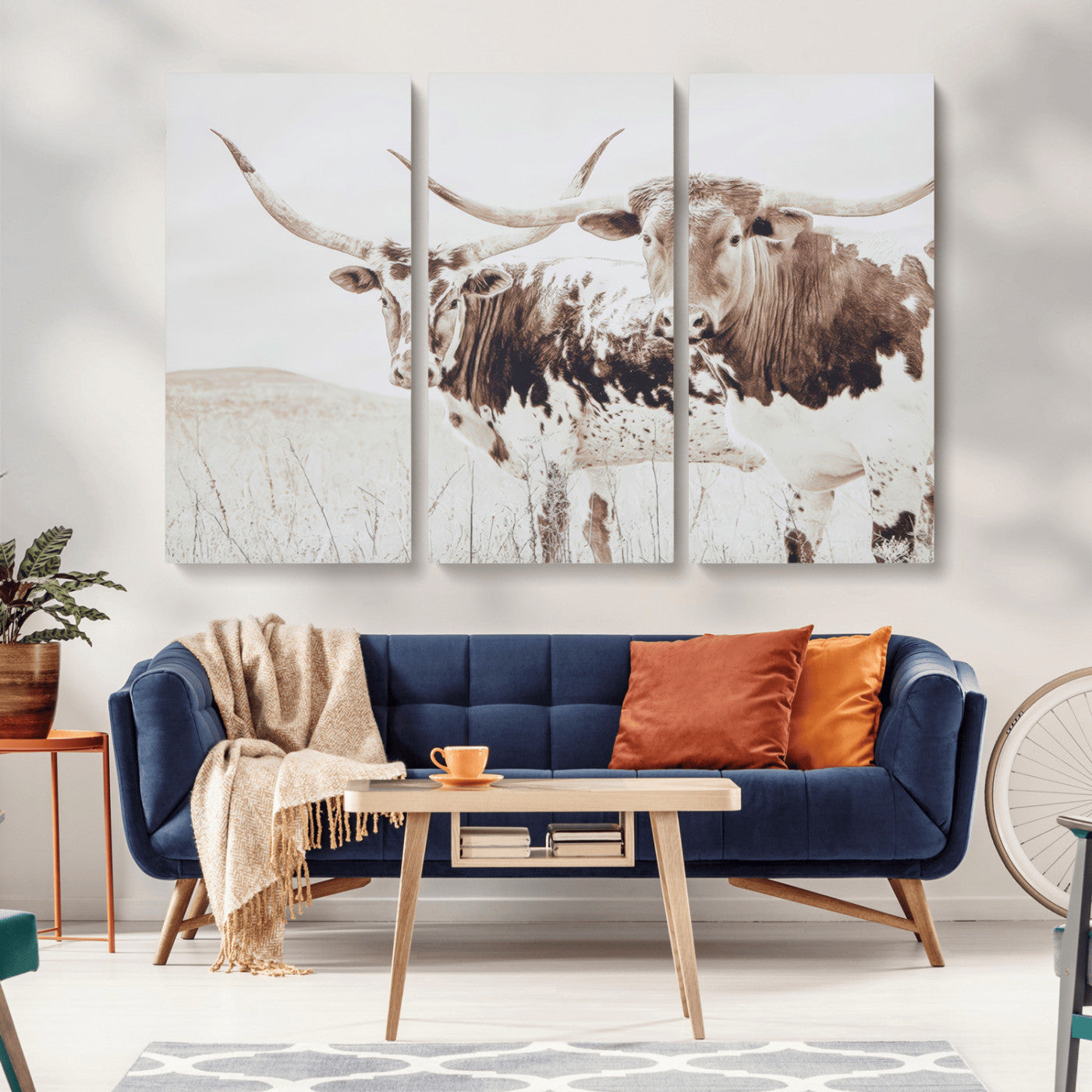 Two longhorn cows standing in a sepia-toned pasture with soft light, ideal for rustic or farmhouse-themed neutral wall decor.