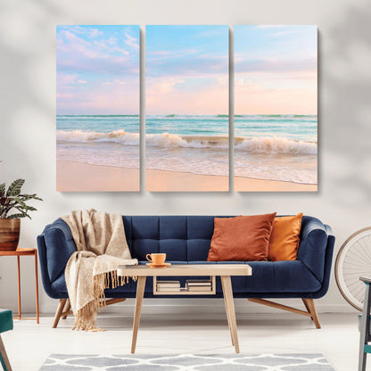 A peaceful beach scene with soft pastel skies, gentle waves washing up on the sandy shore, creating a calm and serene ocean view.