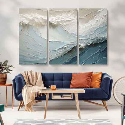 Textured canvas of ocean waves in soft coastal blues and creamy whites, ideal for modern or minimalist coastal-style interiors.