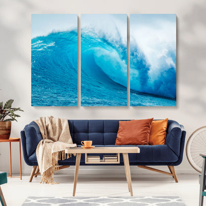 Vibrant canvas of a powerful curling ocean wave in tropical blue tones, perfect for coastal or surf-inspired decor settings.
