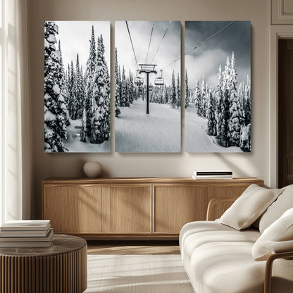 Canvas of a snowy ski lift scene through a forest of tall pine trees, ideal for moody winter or alpine-themed home decor.