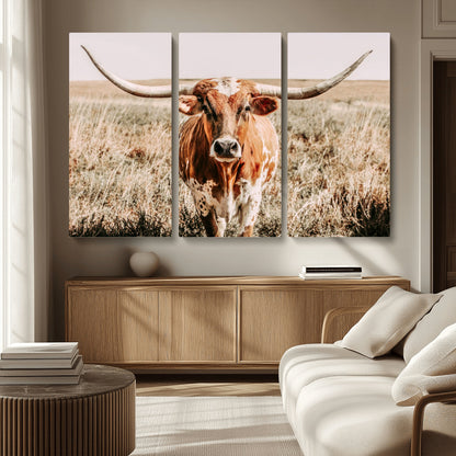 Framed longhorn cow canvas wall art with rustic prairie background, western animal print perfect for farmhouse or ranch style decor