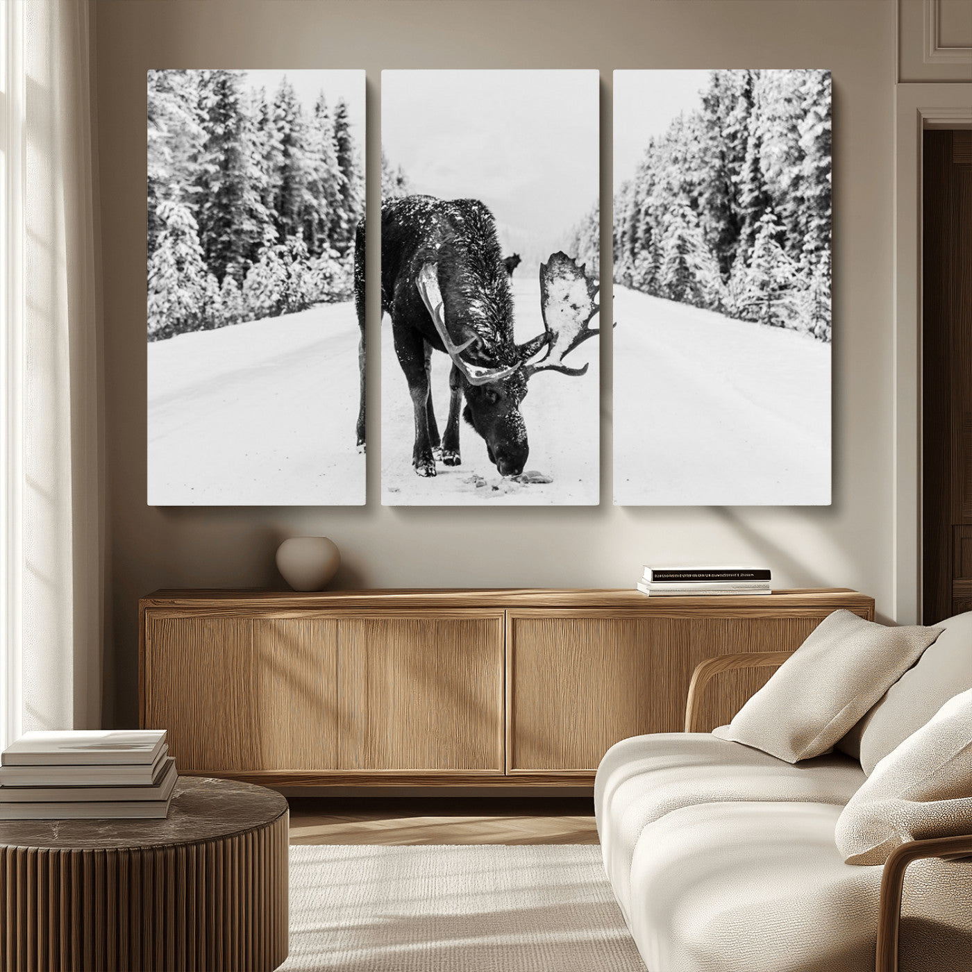 A majestic moose grazing in the snow-covered wilderness, surrounded by snow-covered trees, creating a peaceful winter scene.