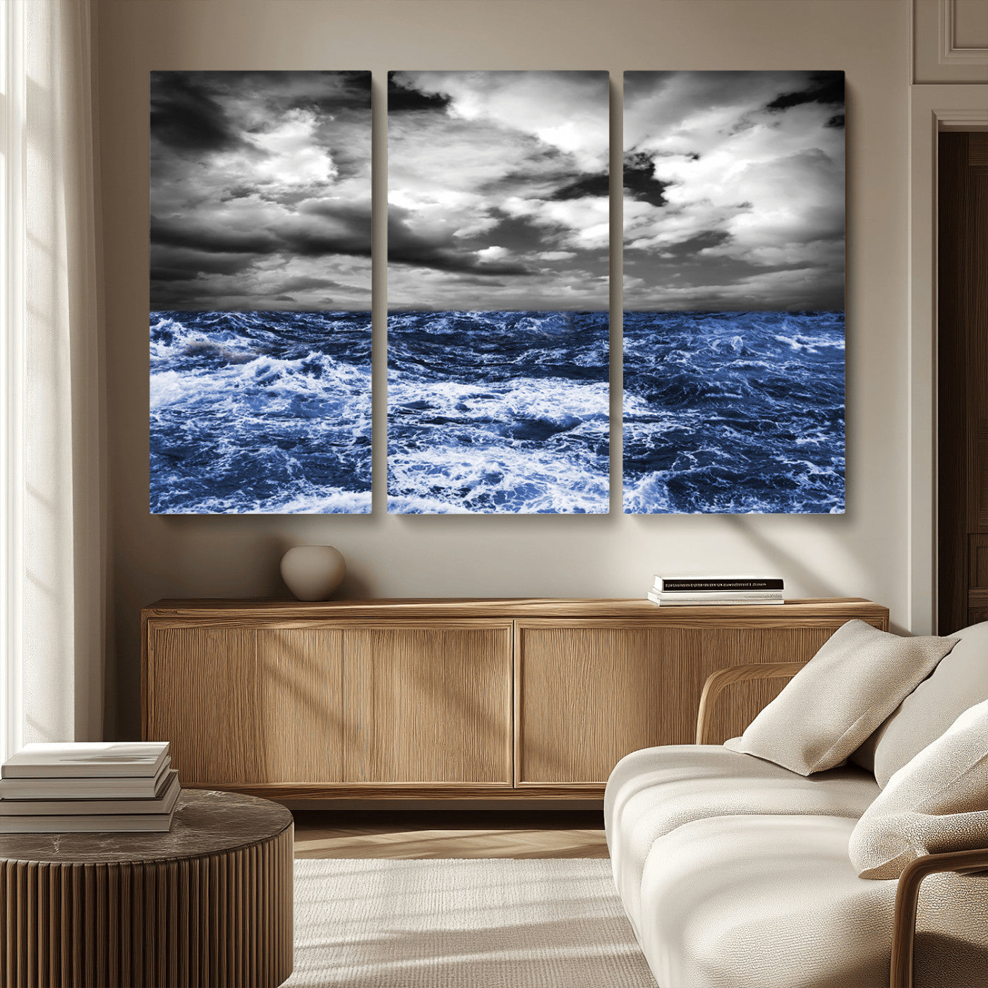 Moody canvas wall art of a stormy ocean under a dramatic black-and-white sky, perfect for bold or coastal-style interiors.