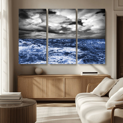 Moody canvas wall art of a stormy ocean under a dramatic black-and-white sky, perfect for bold or coastal-style interiors.
