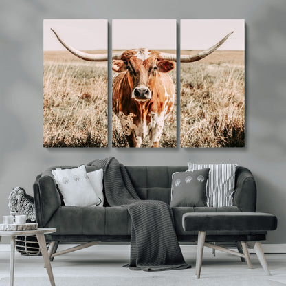 Framed longhorn cow canvas wall art with rustic prairie background, western animal print perfect for farmhouse or ranch style decor