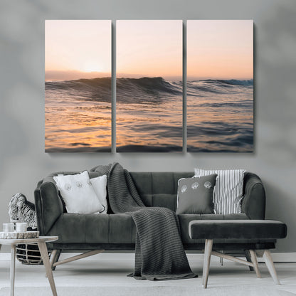 Framed canvas of ocean waves glowing in sunset light, ideal for golden hour calm or peaceful coastal-inspired wall decor.