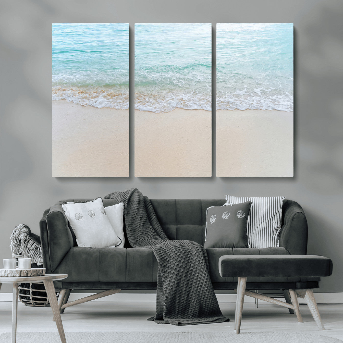 Soft shoreline with gentle aqua waves on smooth sand, ideal for minimalist coastal or pastel ocean-inspired home wall decor.