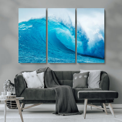 Vibrant canvas of a powerful curling ocean wave in tropical blue tones, perfect for coastal or surf-inspired decor settings.