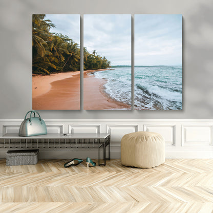 Framed canvas of a tropical beach with palm trees and soft waves, ideal for coastal escape or serene nature-inspired home decor.