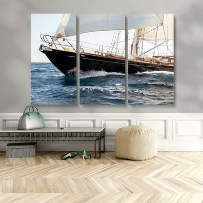 Close-up of a classic sailing yacht with wooden deck and full sails, perfect for nautical or coastal-style decor in ocean-themed spaces.