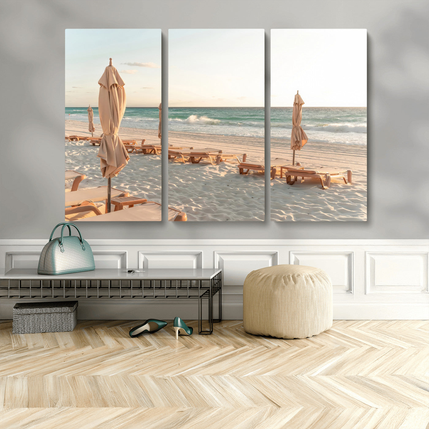 Minimalist photo of empty beach loungers and umbrellas on soft sand, ideal for calm seaside or pastel coastal-style home decor.