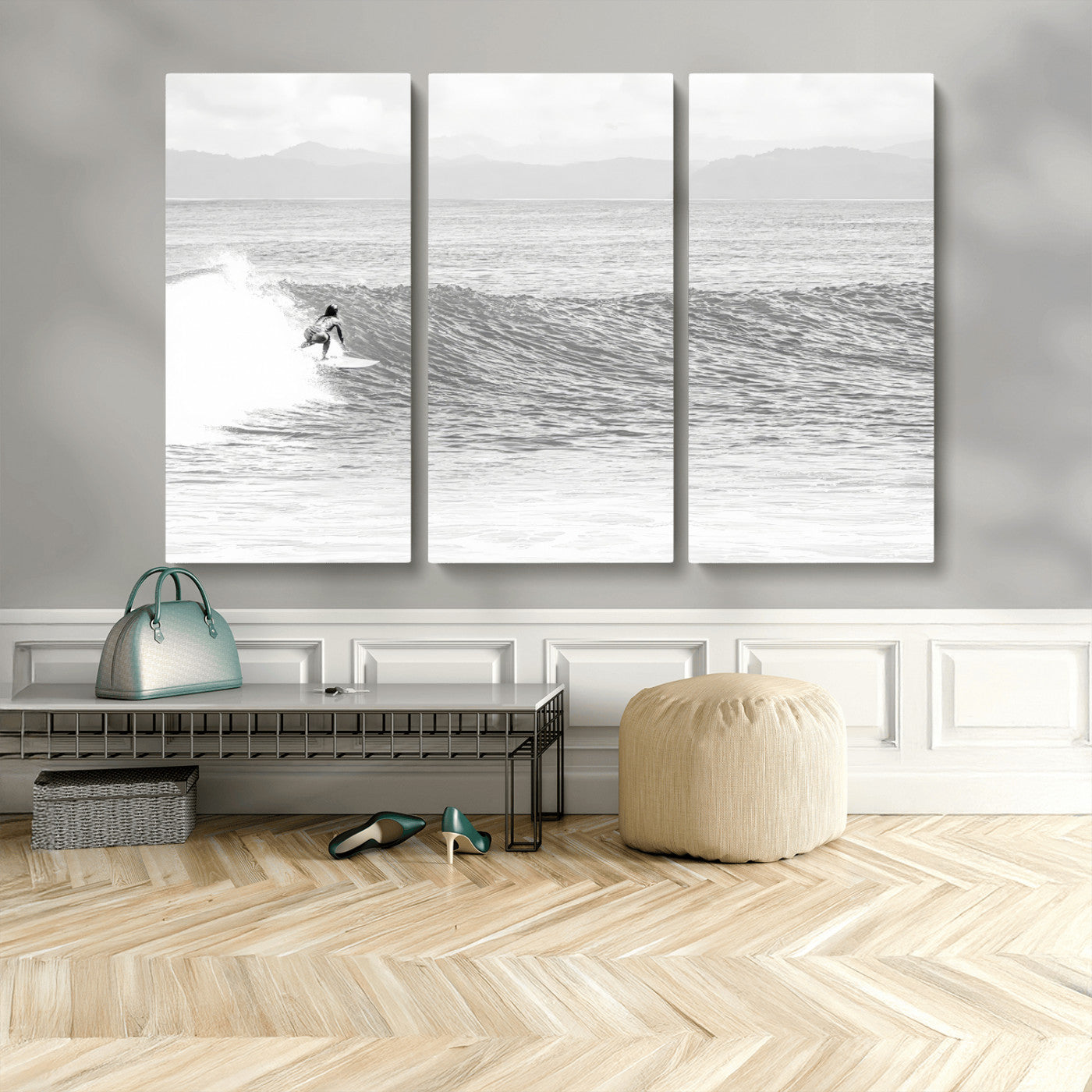 Monochrome photo of a surfer riding a wave with distant mountains, ideal for coastal motion or black and white surf-themed wall decor.
