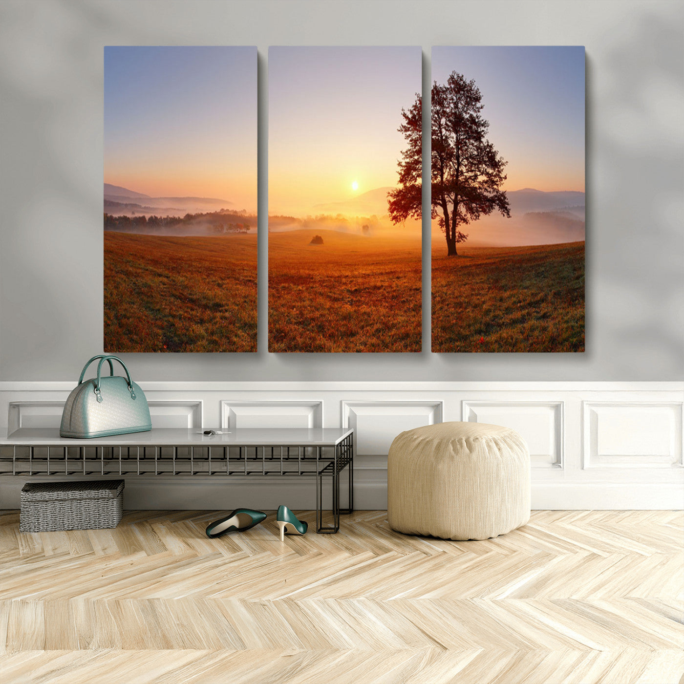 A tranquil landscape at sunrise with a mist-covered field and a lone tree, creating a peaceful and natural atmosphere.
