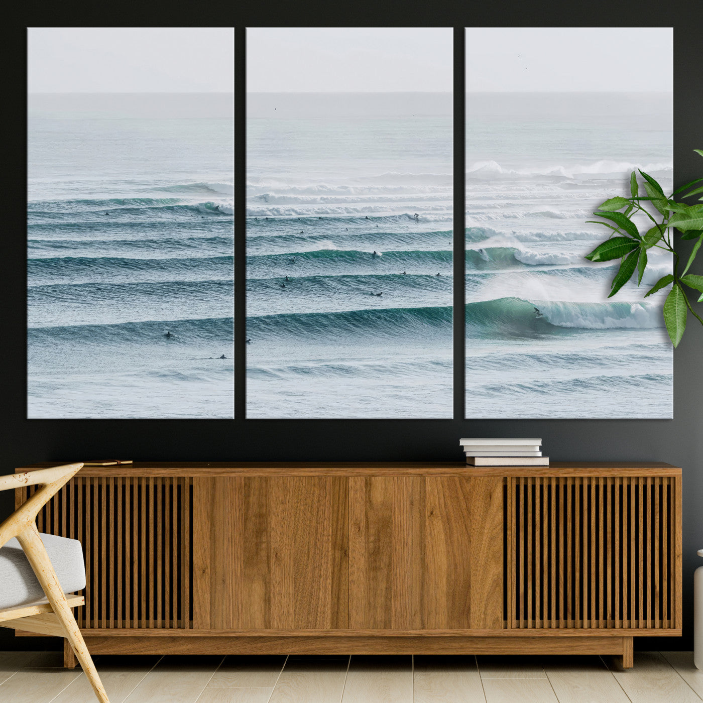 High-angle view of surfers lining up across layered ocean waves, ideal for minimal coastal or surf-inspired room decor.