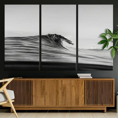 Striking black and white photo of a curling wave, ideal for modern coastal or minimalist wall decor settings.