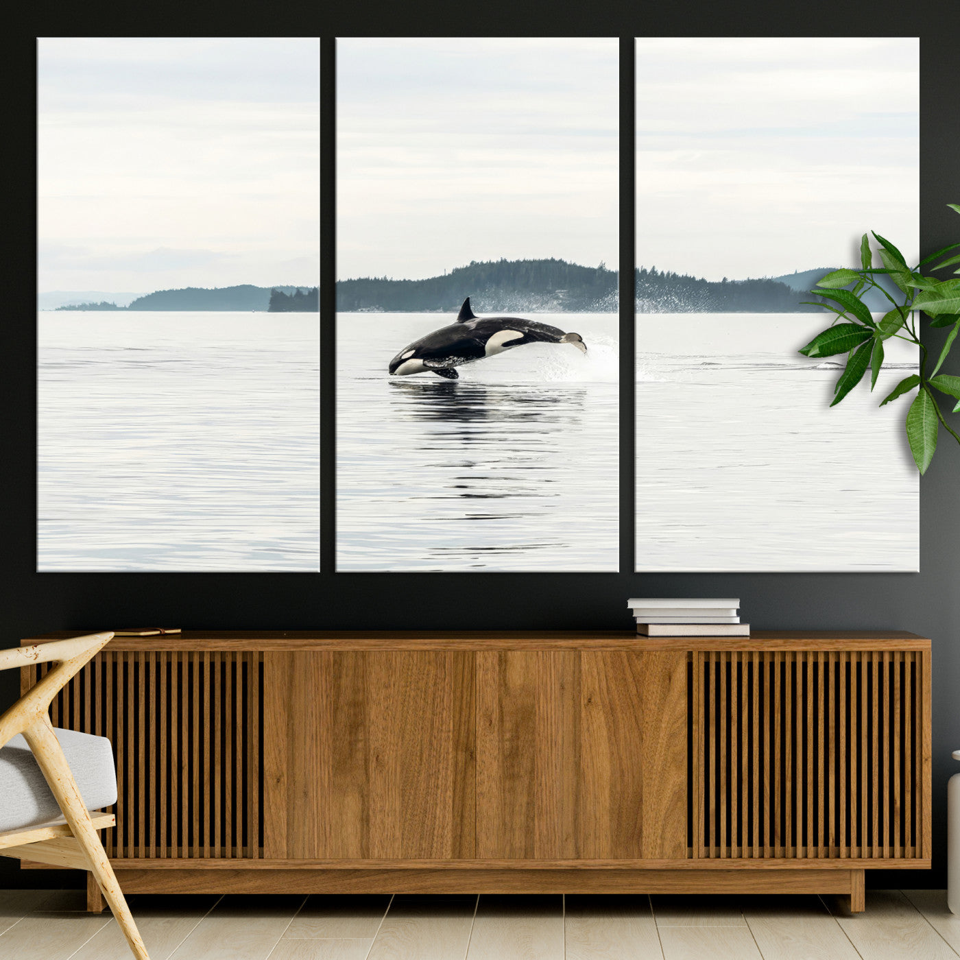 An orca jumping out of calm ocean waters with a misty island in the background, creating a serene and minimalist marine wildlife scene.