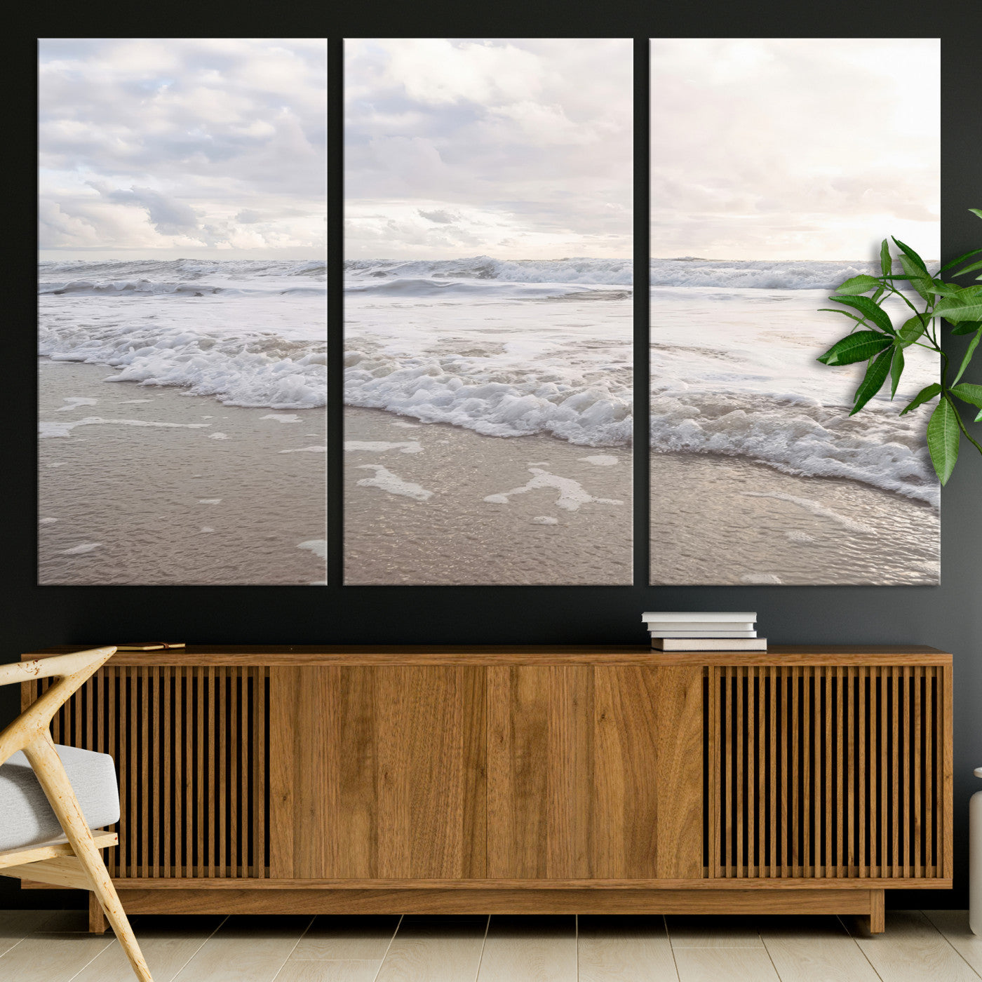 Peaceful ocean waves rolling onto the sandy shore under soft light, perfect for neutral or coastal minimalist decor themes.