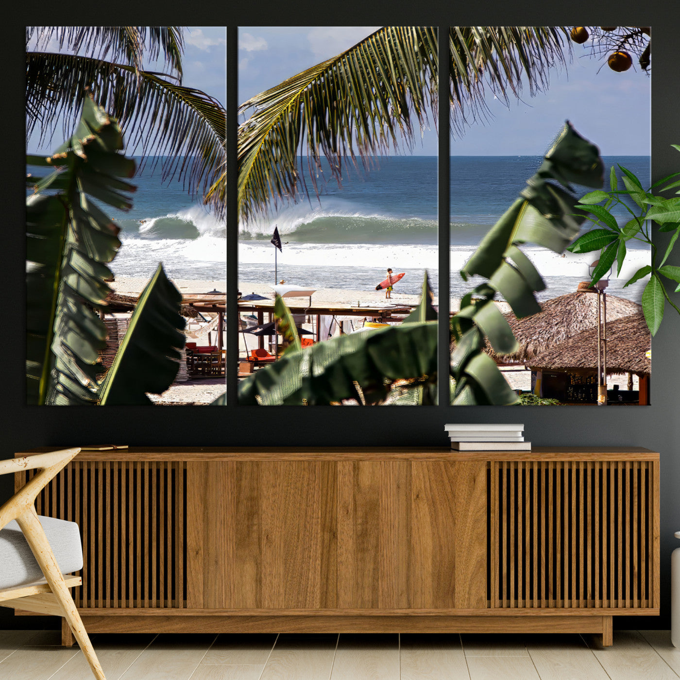 Canvas wall art of a tropical surf scene framed by palm trees, with a surfer on the shore and waves rolling in, ideal for beach-themed decor.