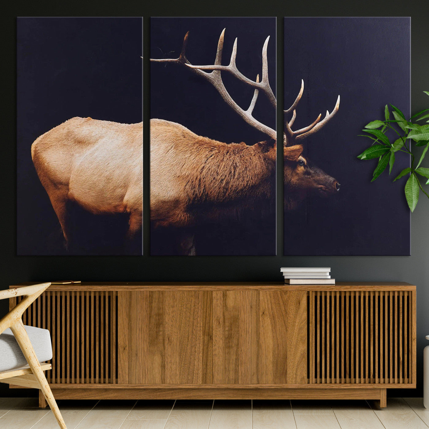 Side profile of an elk with large antlers on dark background, creating a bold rustic statement for cabin or Western-themed decor.