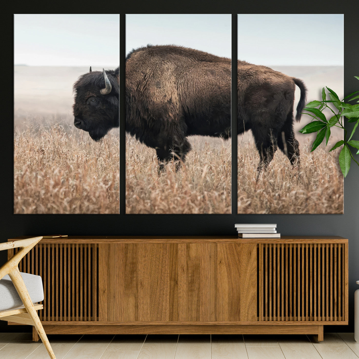 A lone bison stands in a vast prairie under a soft sky, evoking freedom and rustic charm for western or farmhouse inspired interiors.