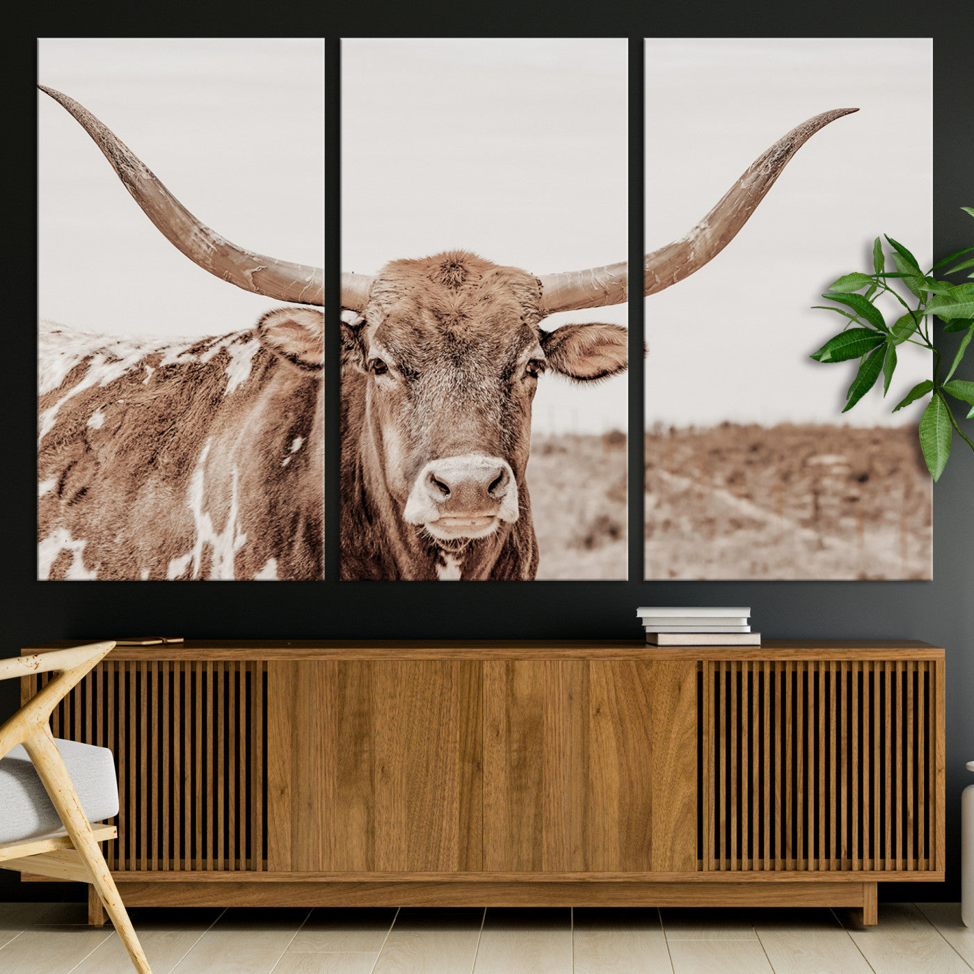 A longhorn cow in soft beige desert tones, standing calmly in open land, perfect for neutral western or rustic farmhouse interiors.