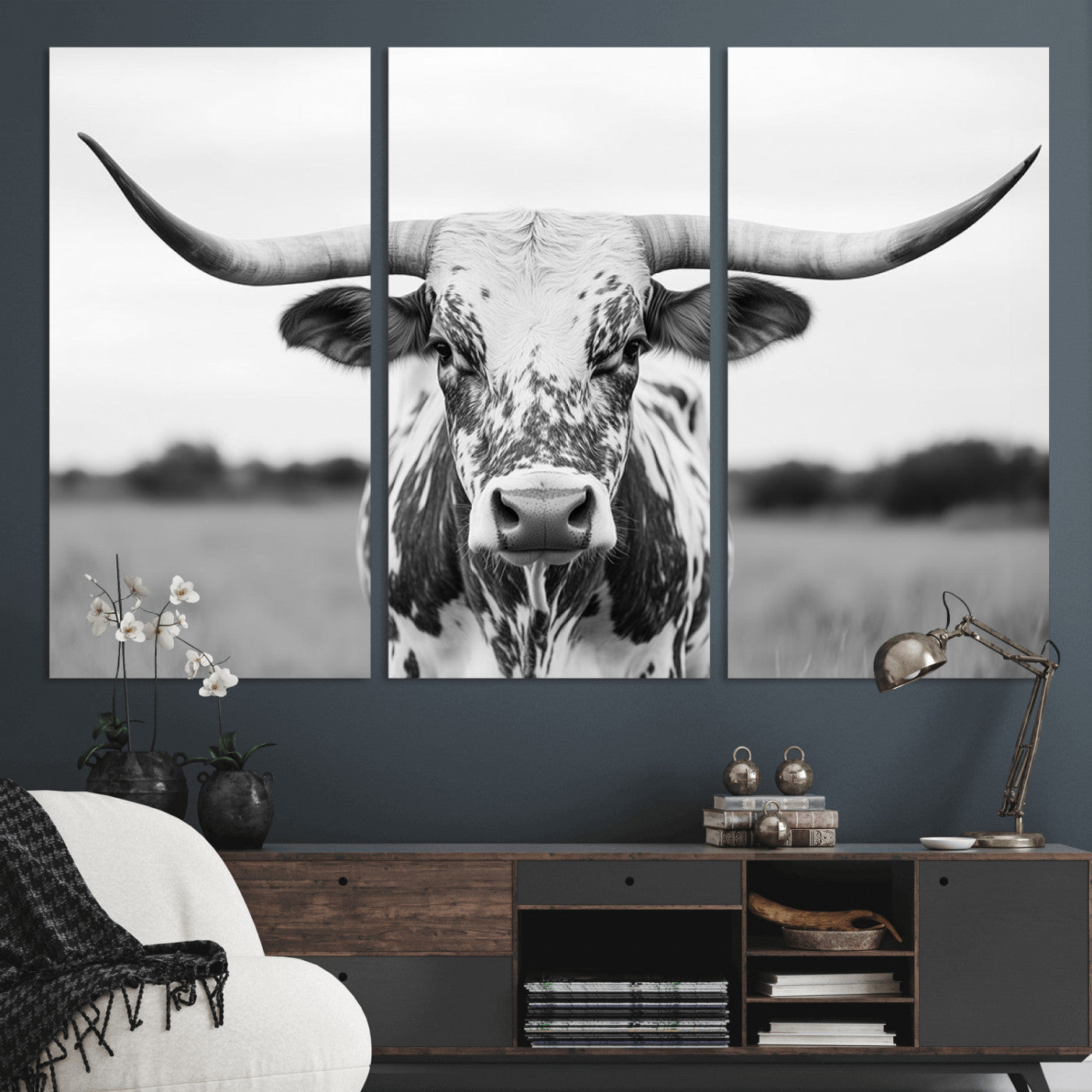 Capture the strength and elegance of nature with this striking black and white portrait of a longhorn cow. Its powerful presence makes a bold statement in any room.