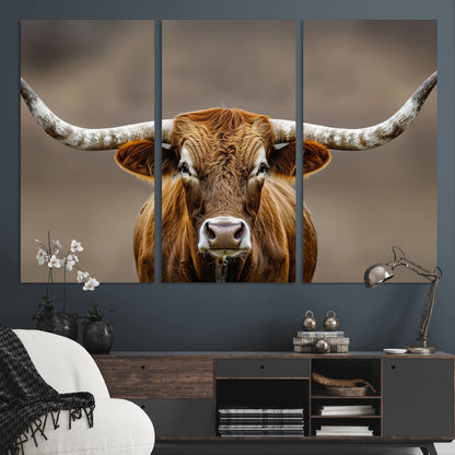 Close-up of a Texas Longhorn with strong curved horns and warm brown tones, perfect for rustic or western-style wall decor.