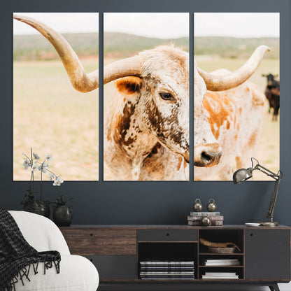 Close-up of a speckled Texas Longhorn in warm prairie tones, perfect for rustic western or countryside-themed room decor.