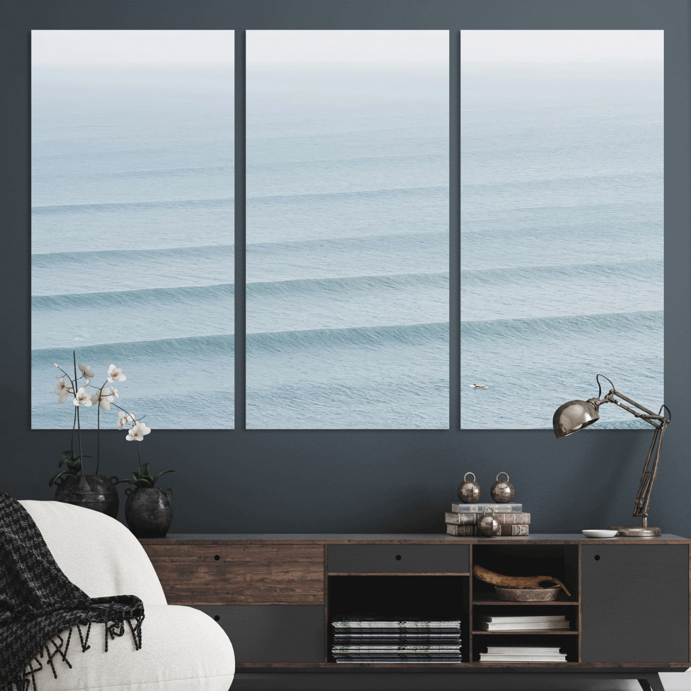 Framed canvas of repeating ocean waves with a distant solo surfer, ideal for minimalist ocean or calm coastal wall decor.