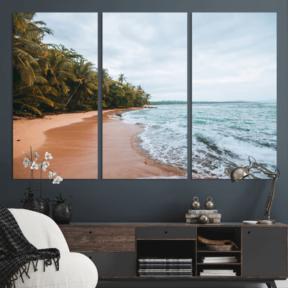 Framed canvas of a tropical beach with palm trees and soft waves, ideal for coastal escape or serene nature-inspired home decor.
