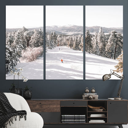 Bright ski trail lined with snow-covered pines and a skier in orange, perfect for alpine adventure or winter sports-inspired decor.