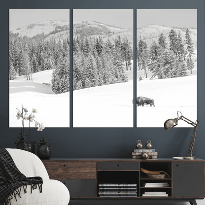 Snowy bison walking through white forest landscape, ideal for monochrome winter or wilderness-style interior wall decoration.