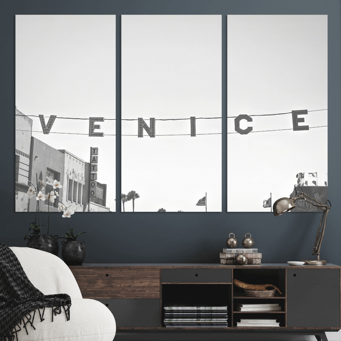 Black and white photo of Venice Beach sign and palm-lined street, perfect for urban coastal or minimalist LA-inspired wall decoration.