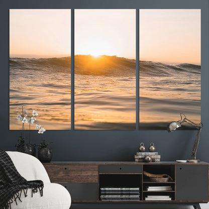 Ocean waves glowing under a warm golden sunset, reflecting soft light and calm movement, perfect for warm minimalist coastal interiors.