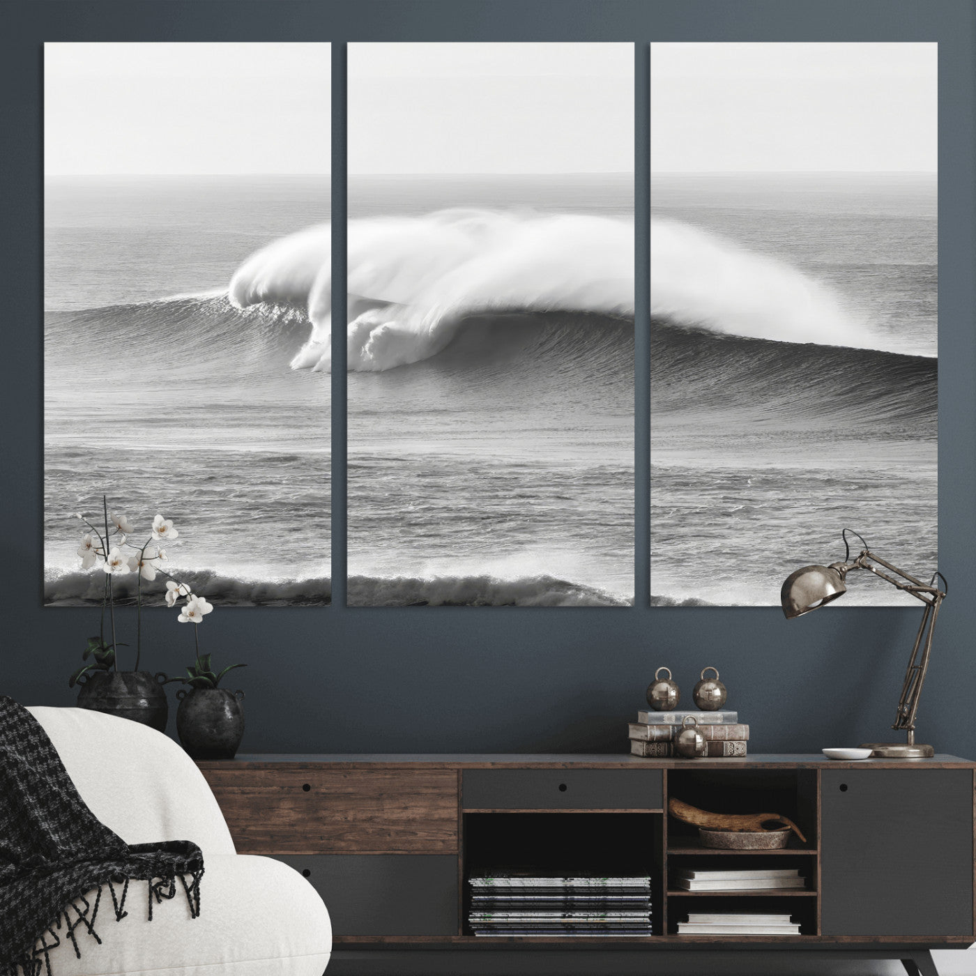 A dramatic black and white ocean wave crashing with immense force, capturing the raw power and movement of the sea in a bold seascape.