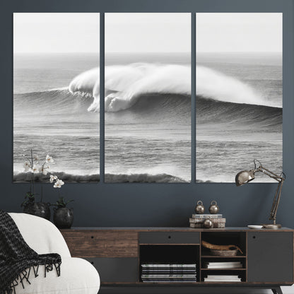 A dramatic black and white ocean wave crashing with immense force, capturing the raw power and movement of the sea in a bold seascape.